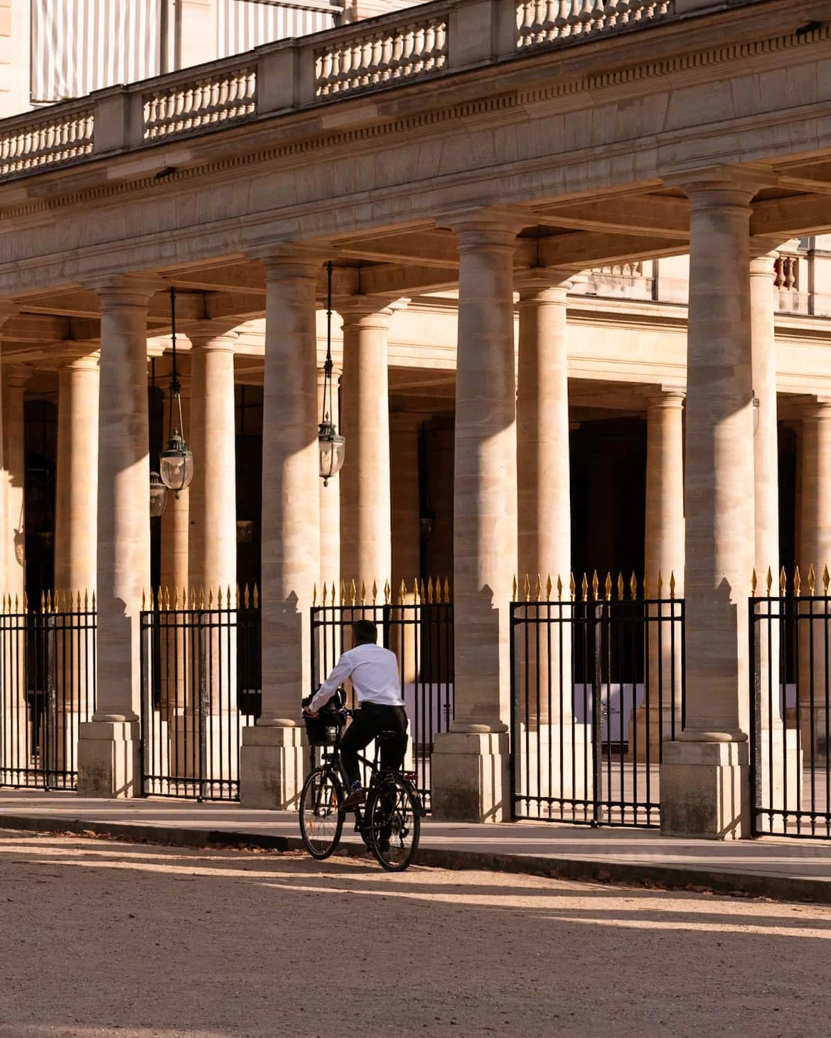Paris biker at Jardin du Palais Royal Paris