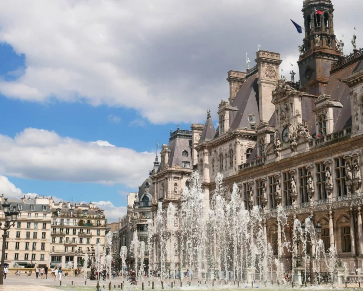 the facade and fountains outside Hotel de Ville