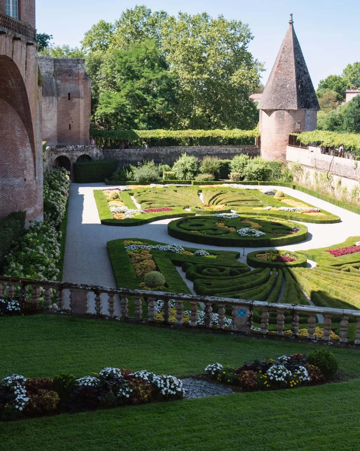 Gardens of Palais de la Berbie, Albi, France with a view of the palace