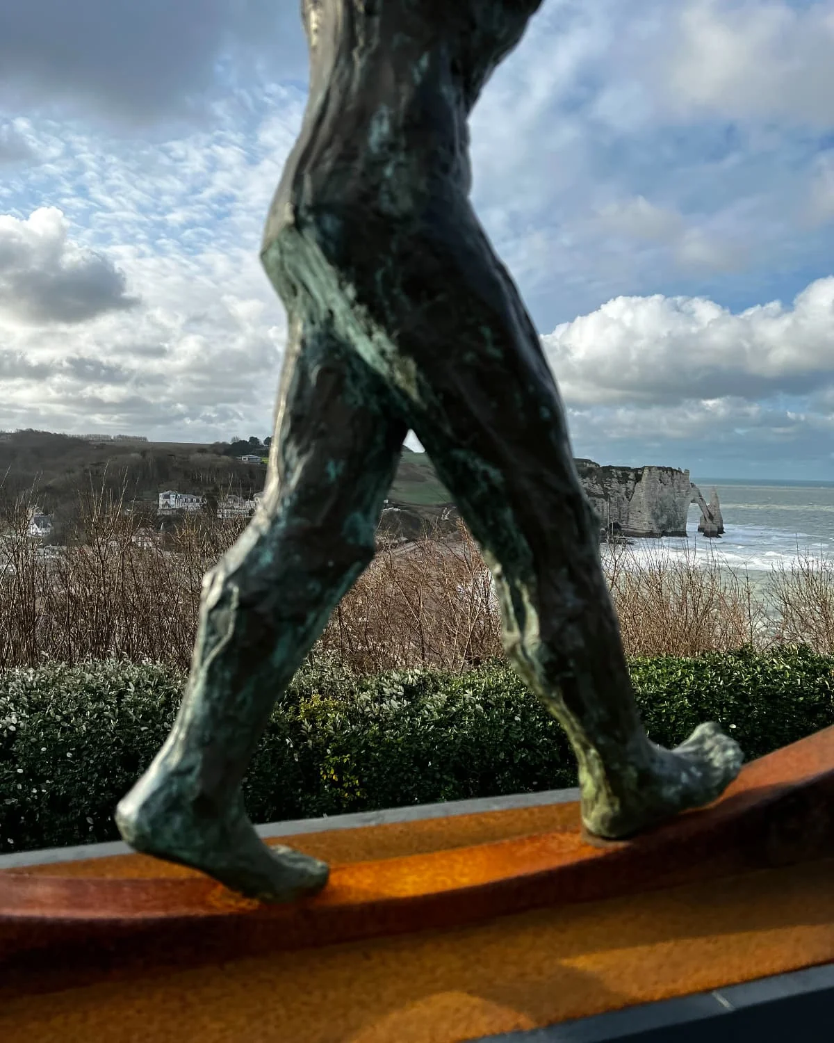 The cliffs of Étretat and art at gardens of Étretat, Normandy