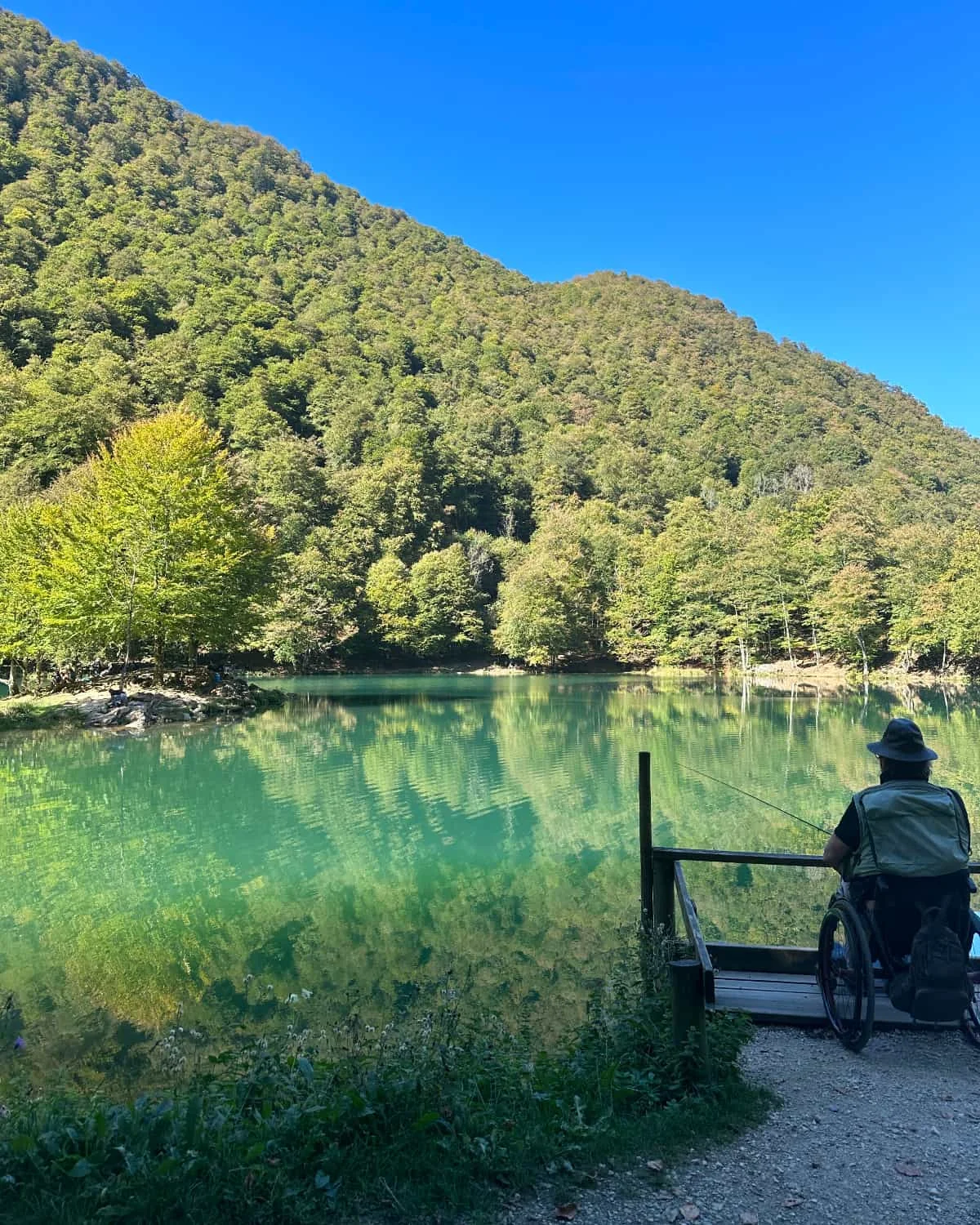 Man fishing at Lac de Bethmale