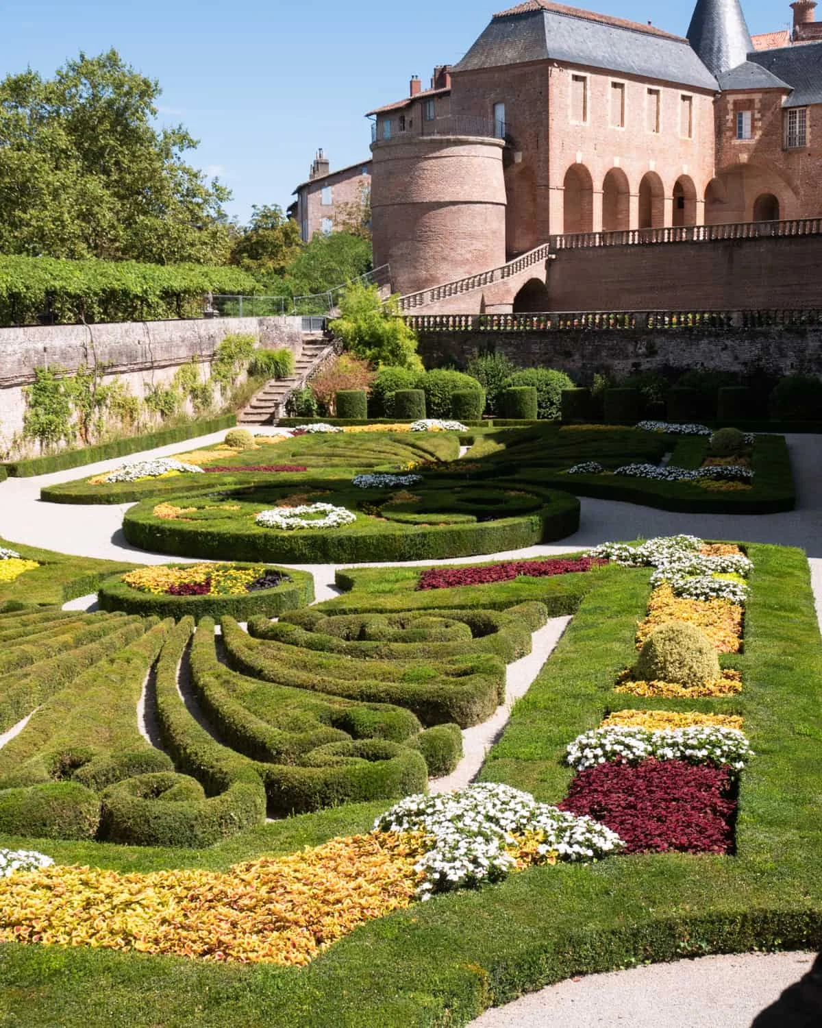 Gardens of Palais de la Berbie, Albi, France with a view of the palace