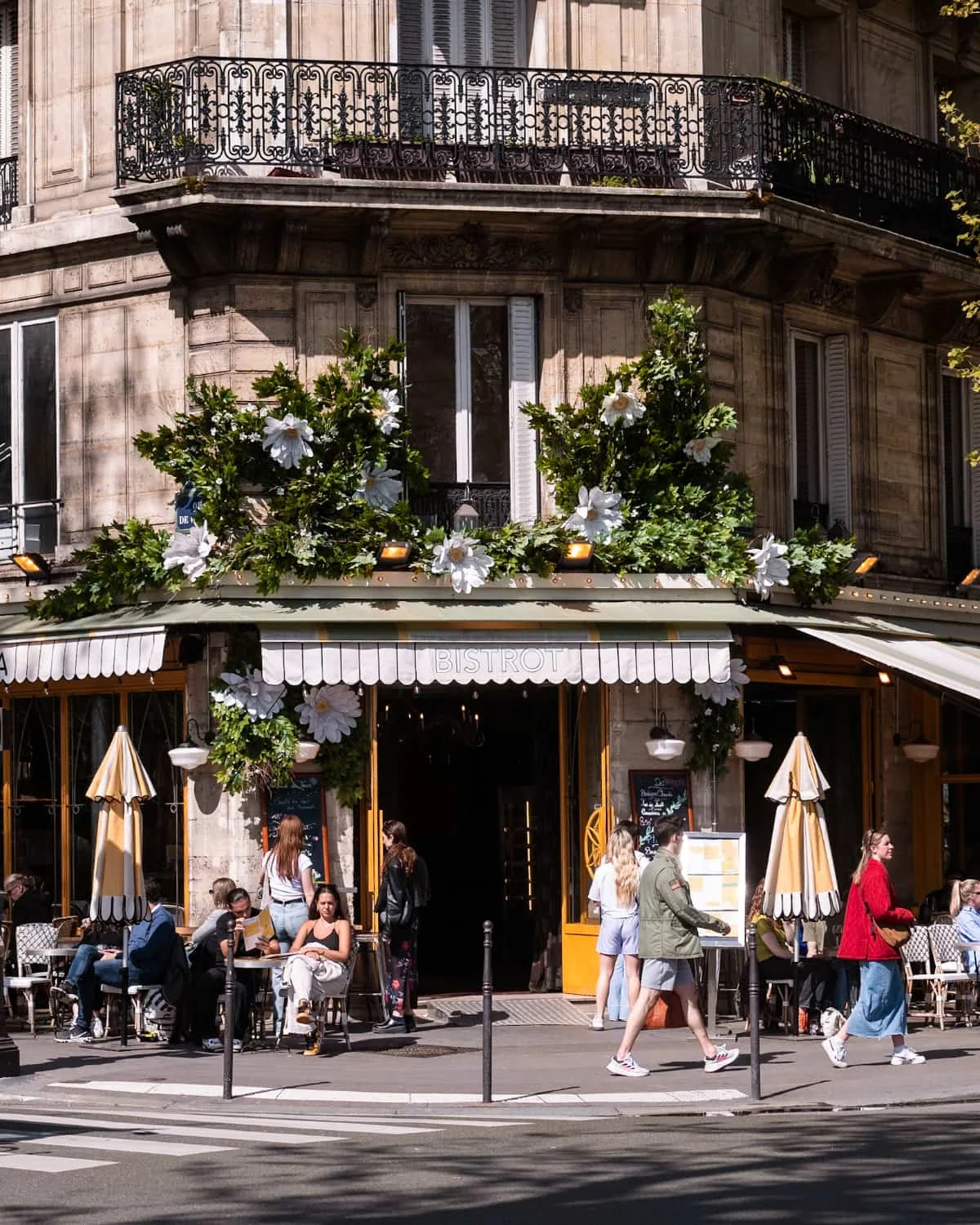 Parisian walking on the streets of Le Marais, Paris
