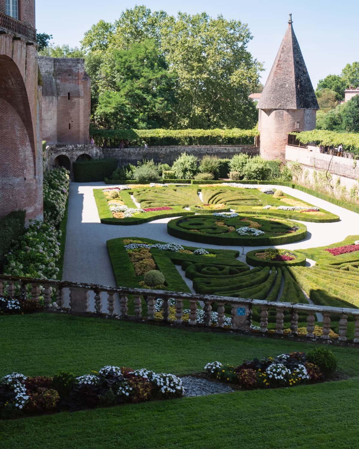 Gardens of Palais de la Berbie, Albi, France with a view of the palace
