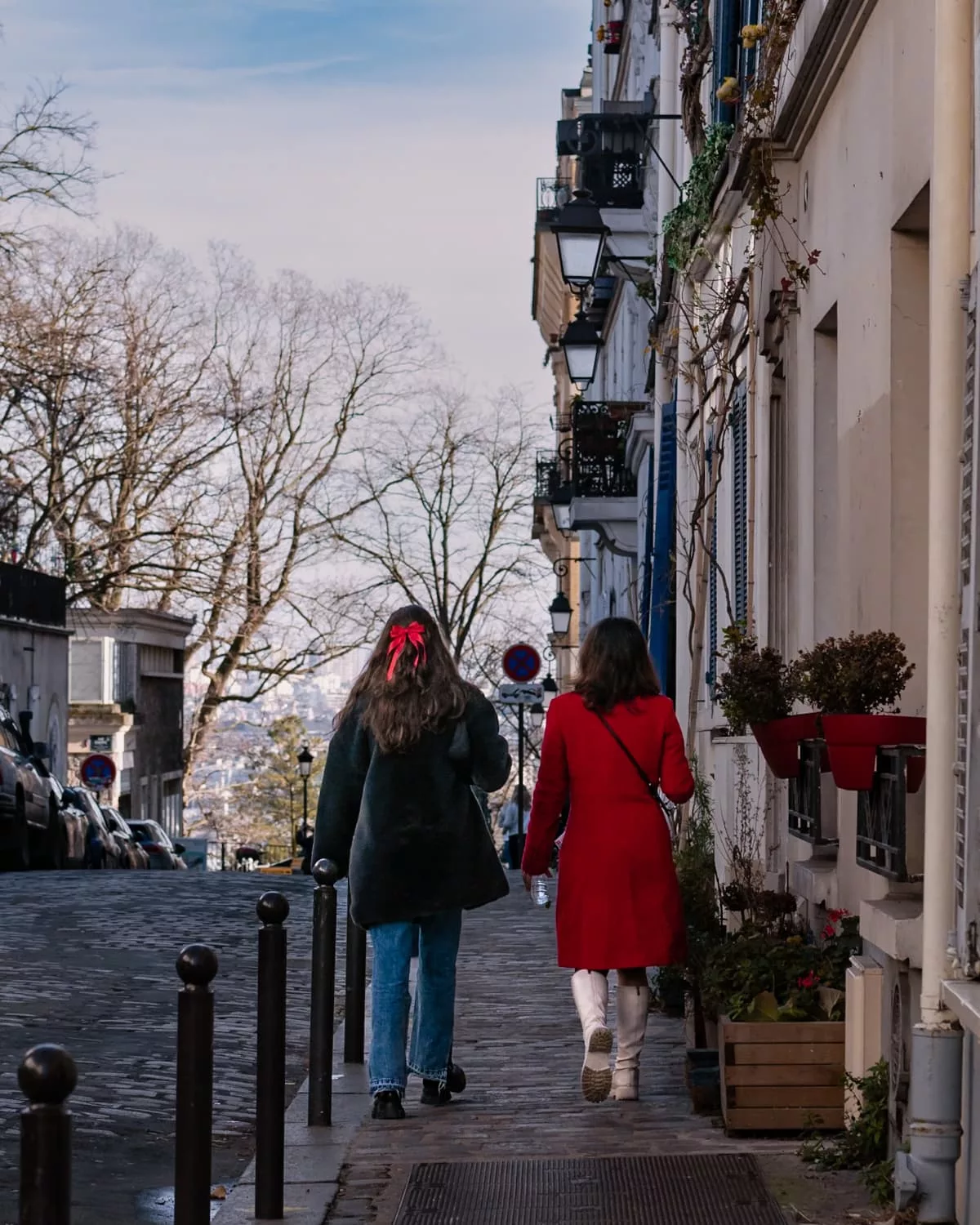 Two girls walking in Montmartre Paris