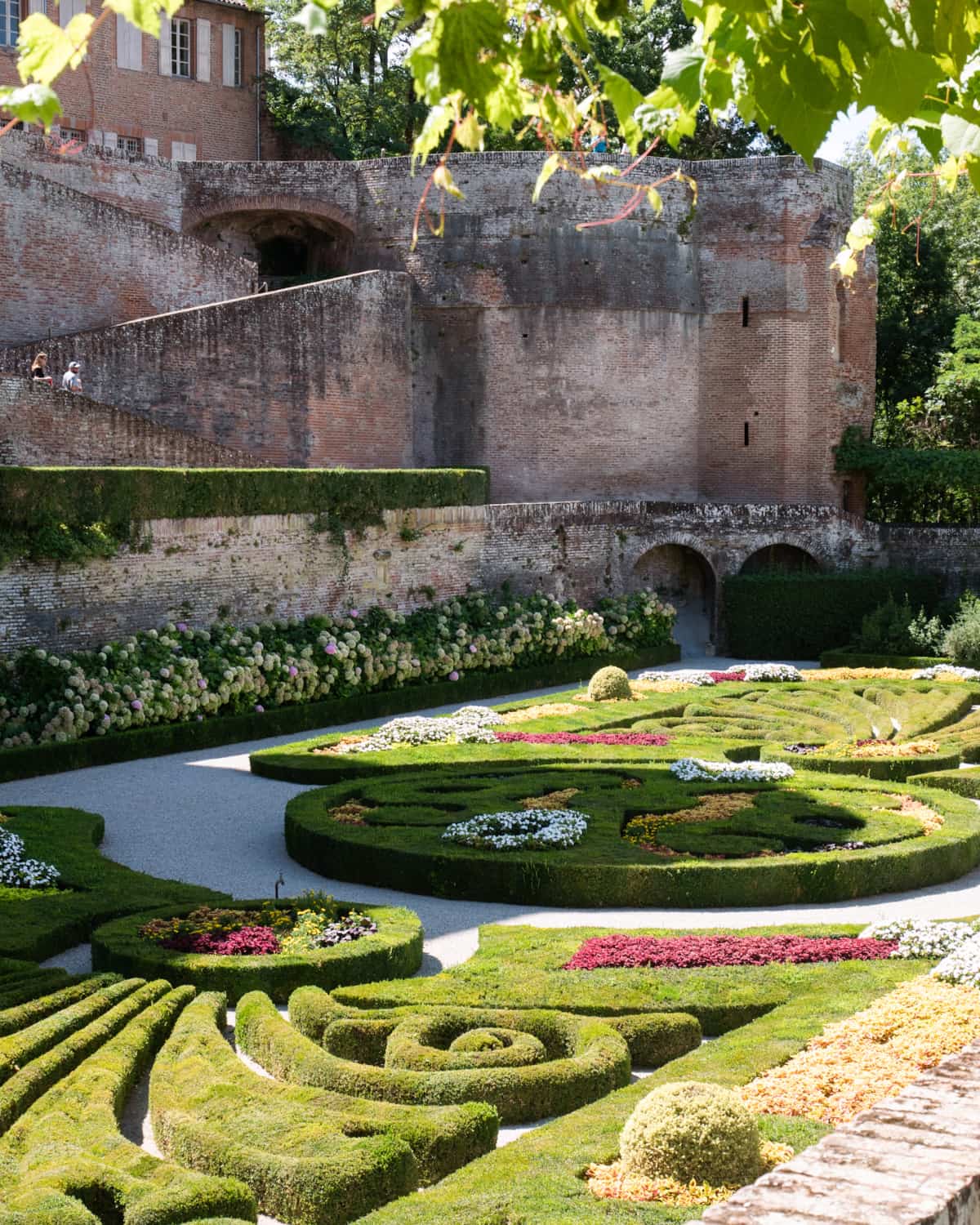 Gardens of Palais de la Berbie, Albi, France with a view of the palace